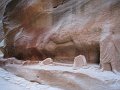  The Siq, Petra. Water distribution line and camel caravan statues carved in the mountain side.